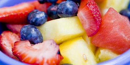 View of Fresh Watermelon, Pineapple, Strawberries & Blueberries in a Bowl at The Dunes