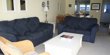 View of Couch, Chair and Table in Matty Townhouse B7