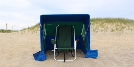 View of a Beach Chair & Cabana Sitting on the Sand at South Beach