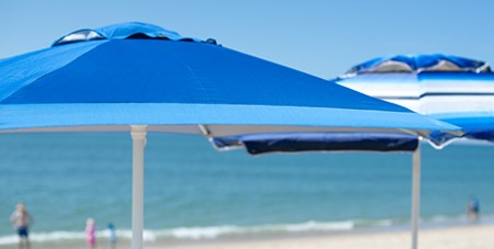 View of Colorful Umbrellas on the Sand at South Beach in Edgartown