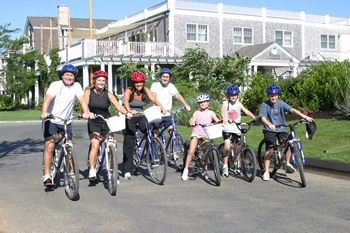 Family on Bikes in Front of the Winnetu Oceanside Resort