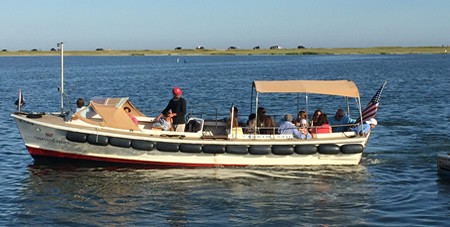 View of The Dunes Water Taxi Boat with Passengers