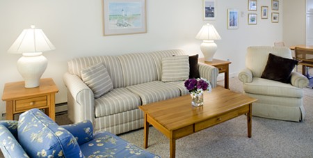 View of couch and table in A1 Matty Townhouse Living Room