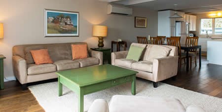 View of Couch and Chairs in Living Room of Mattakesett Townhouse E3