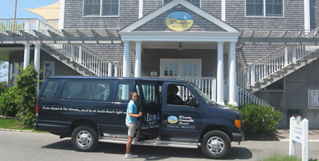 Winnetu Woman Team Member Standing Outside the Shuttle Van to Edgartown