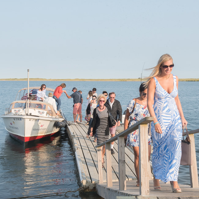 View of People Arriving to The Dunes on the Water Taxi Cruise Boat