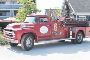View of Little Girls Waiting for a Ride on the Winnetu's Antique Fire Truck