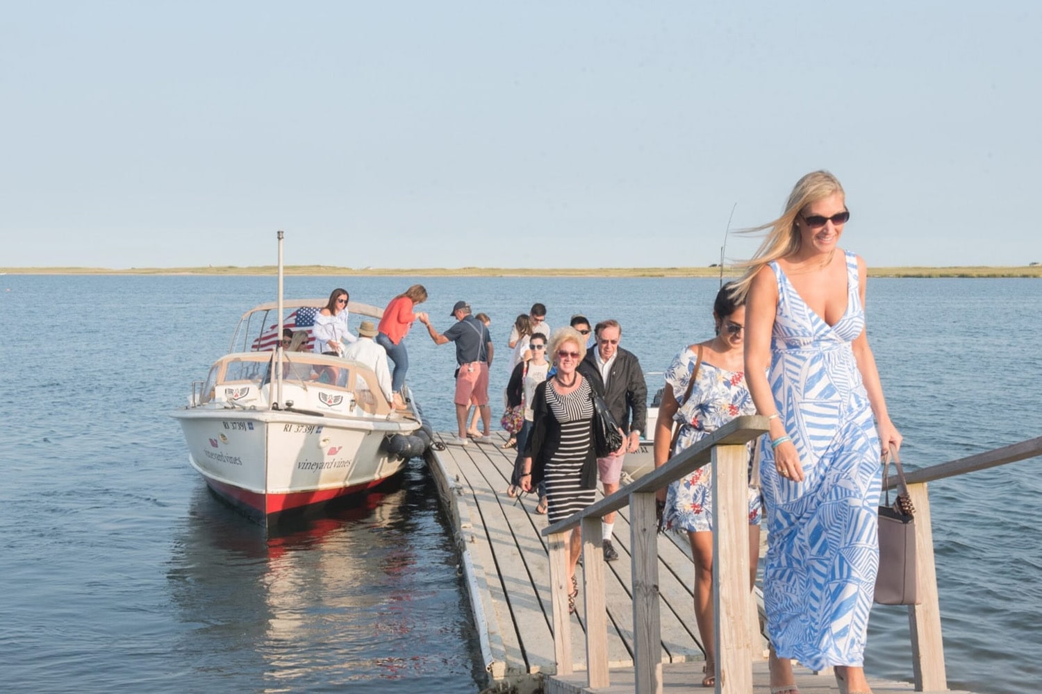 winnetu-homepage-People-on-the-Dock-near-a-Boat